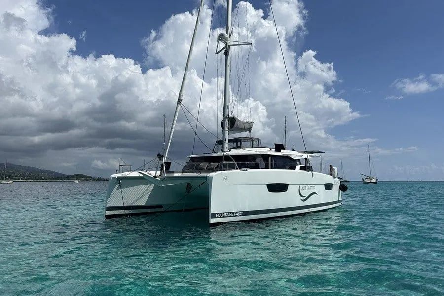 Large catamaran at anchor